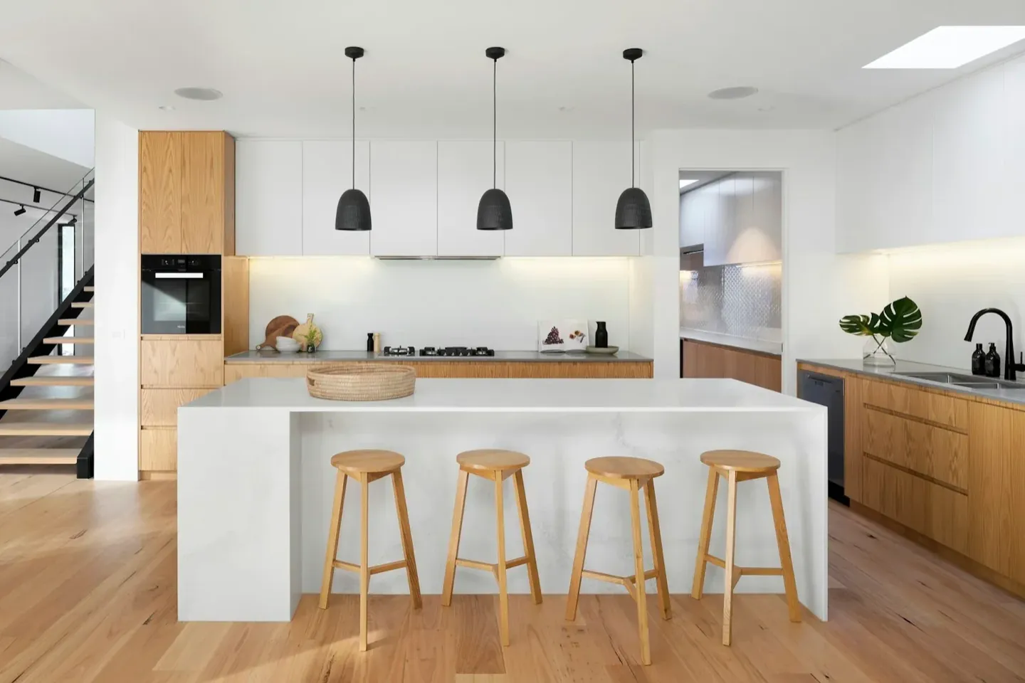 Kitchen planned around cooking and storage routines